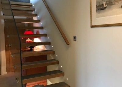 Dimly lit stairs leading to room